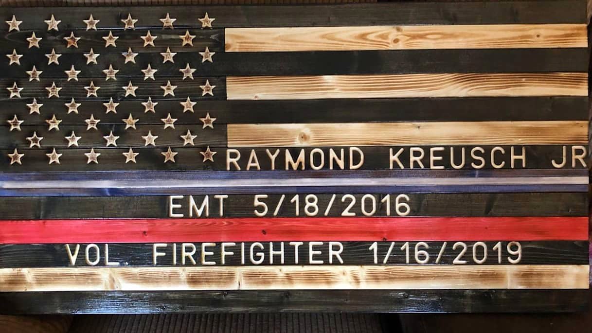 Red line firefighter flag engraved Raymond Kreusch Jr.